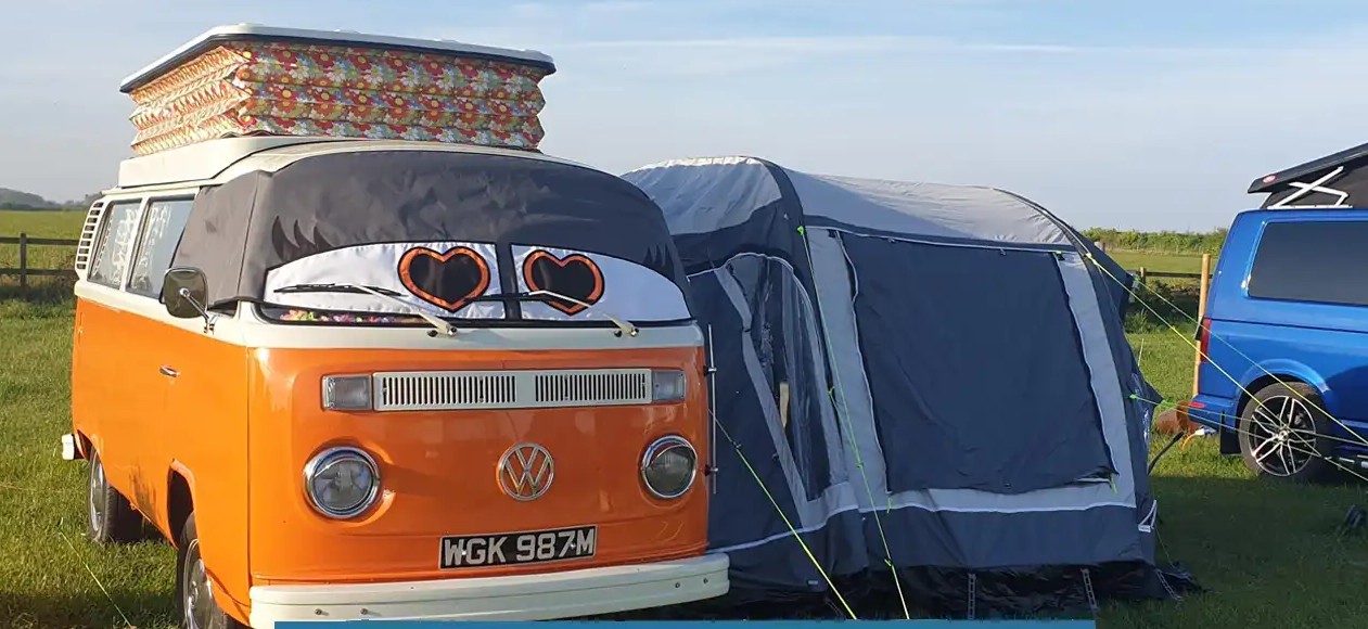 Motorhome pitched on a quiet grass pitch near the coast at Hunstanton, Norfolk, UK